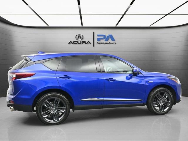 Photo of 2024 Apex Blue Pearl Acura RDX