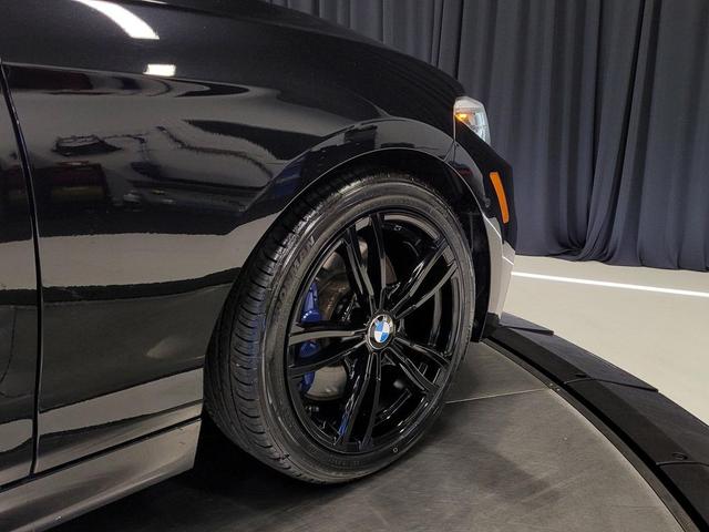 Photo of 2018 Black Sapphire Metallic BMW M240