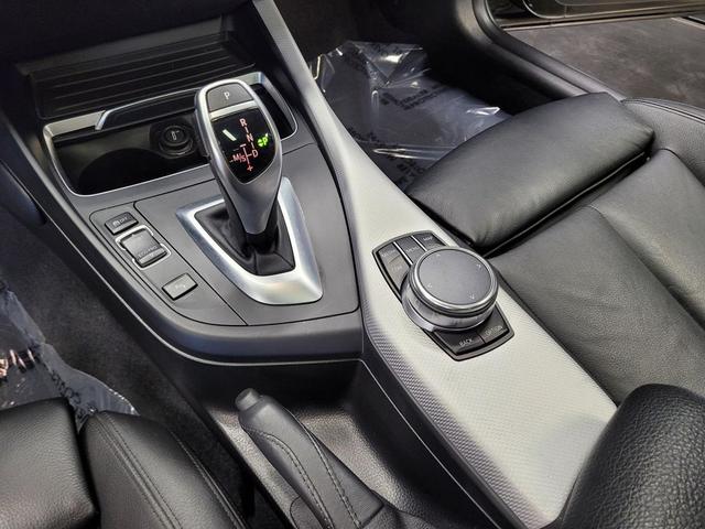 Photo of 2018 Black Sapphire Metallic BMW M240