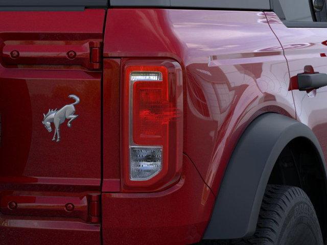 Photo of 2025 Ruby Red Metallic Tinted Clearcoat Ford Bronco