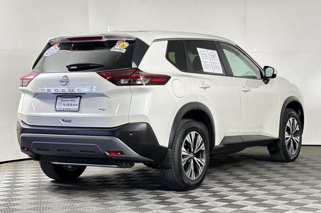 Photo of 2023 Pearl White Tricoat Nissan Rogue