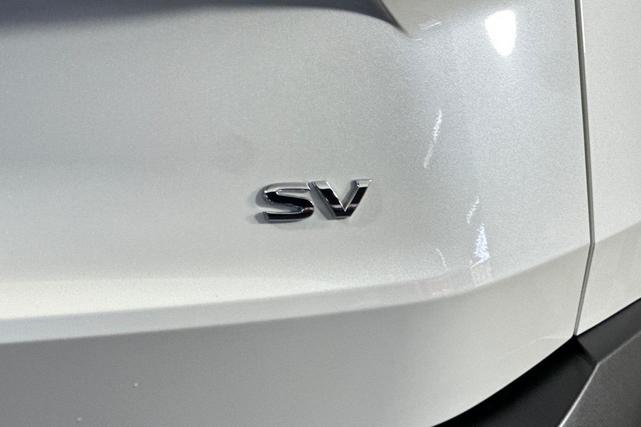 Photo of 2023 Pearl White Tricoat Nissan Rogue