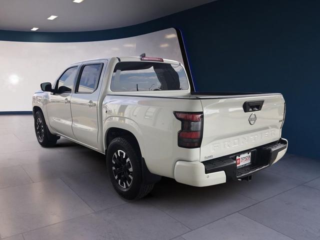 Photo of 2024 Glacier White Nissan Frontier