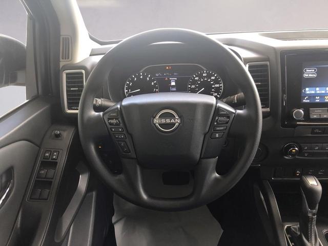 Photo of 2024 Glacier White Nissan Frontier