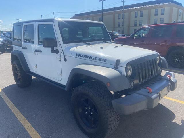 Photo of 2016 Bright White Clearcoat Jeep Wrangler Unlimited