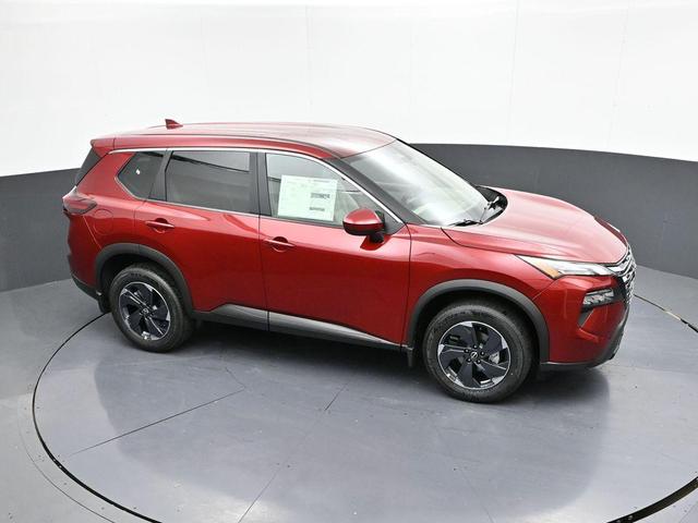 Photo of 2025 Scarlet Ember Tintcoat Nissan Rogue