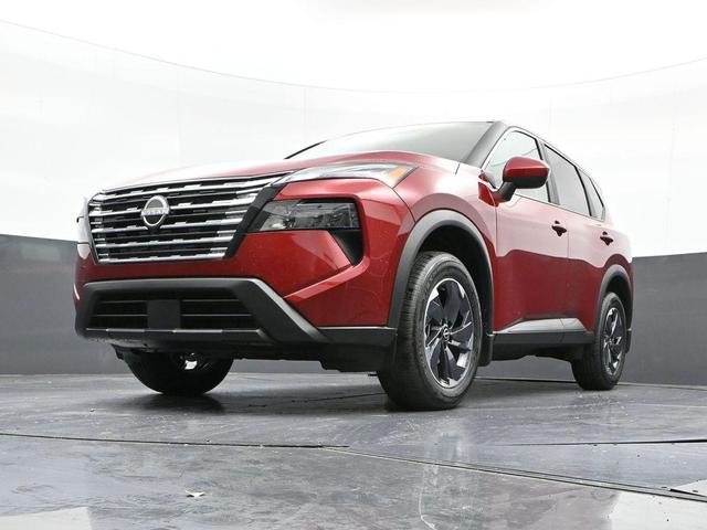 Photo of 2025 Scarlet Ember Tintcoat Nissan Rogue