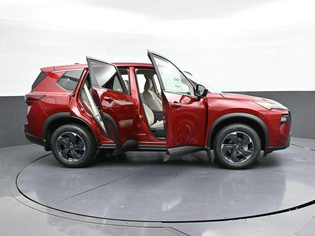 Photo of 2025 Scarlet Ember Tintcoat Nissan Rogue