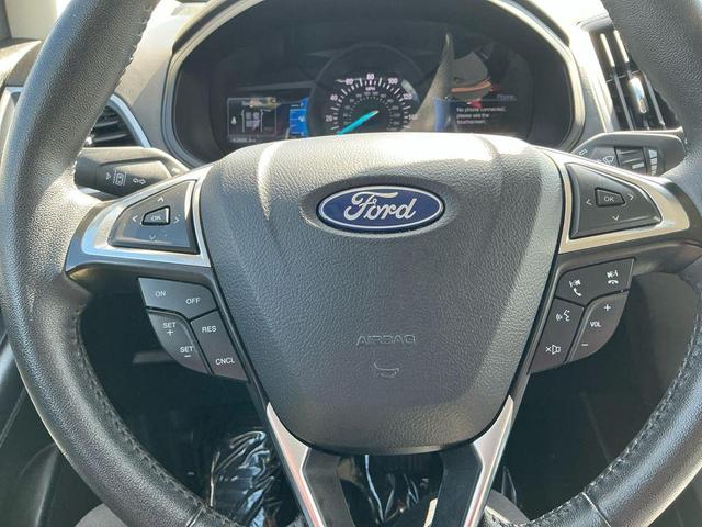 Photo of 2024 Black Metallic Ford Edge