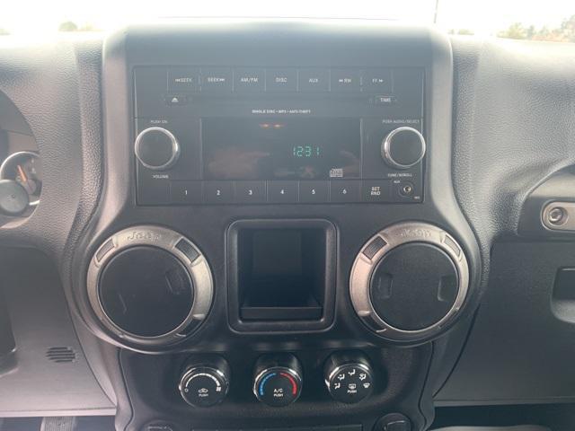 Photo of 2012 Black Forest Green Pearlcoat Jeep Wrangler