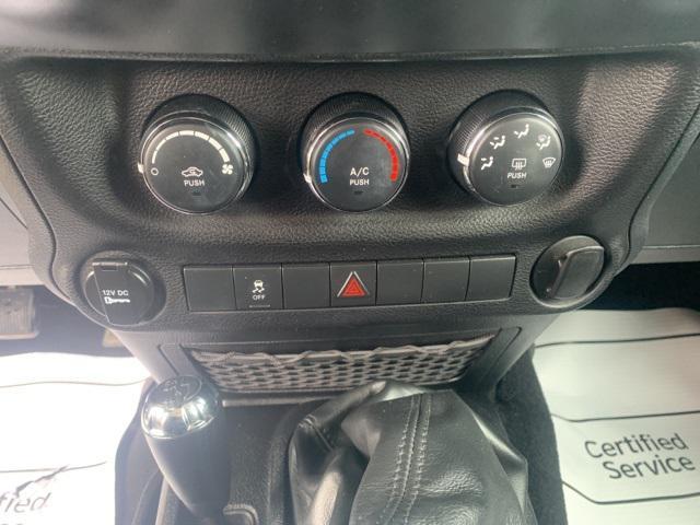 Photo of 2012 Black Forest Green Pearlcoat Jeep Wrangler