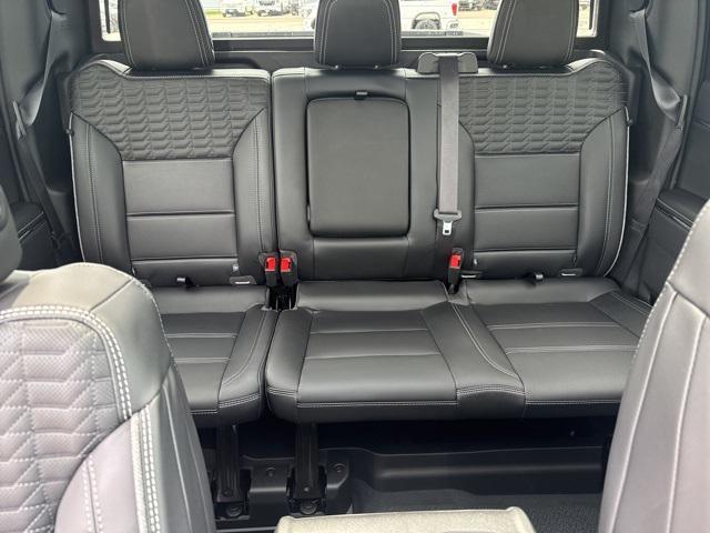 Photo of 2025 Deep Ocean Metallic GMC Sierra EV