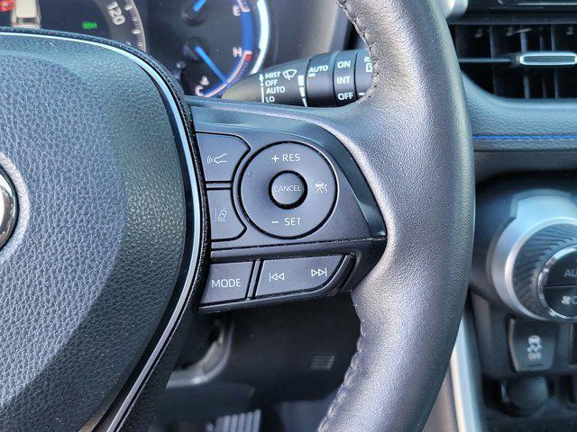 Photo of 2021 Blizzard Pearl/Midnight Black Metallic Toyota RAV4 Hybrid