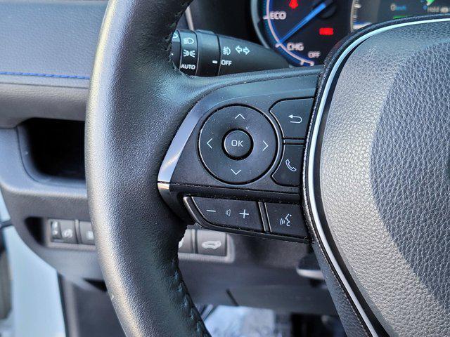 Photo of 2021 Blizzard Pearl/Midnight Black Metallic Toyota RAV4 Hybrid