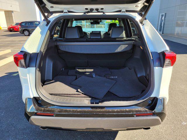 Photo of 2021 Blizzard Pearl/Midnight Black Metallic Toyota RAV4 Hybrid