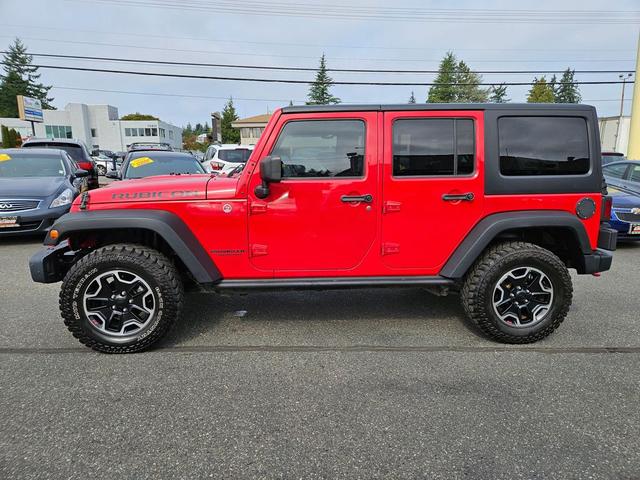 Photo of 2014 Flame Red Clearcoat Jeep Wrangler Unlimited