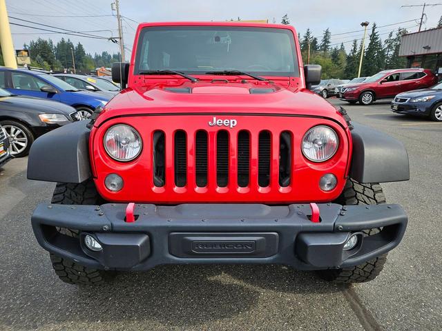 Photo of 2014 Flame Red Clearcoat Jeep Wrangler Unlimited