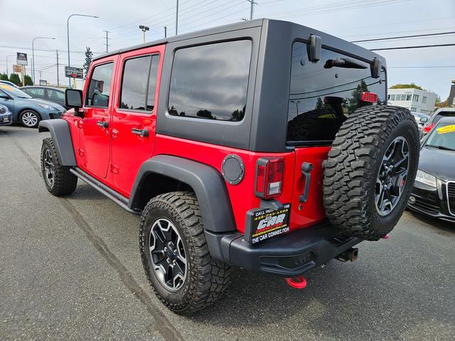 Photo of 2014 Flame Red Clearcoat Jeep Wrangler Unlimited