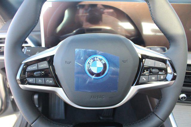 Photo of 2025 Skyscraper Grey Metallic BMW i4 Gran Coupe