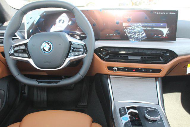 Photo of 2025 Black Sapphire Metallic BMW i4 Gran Coupe