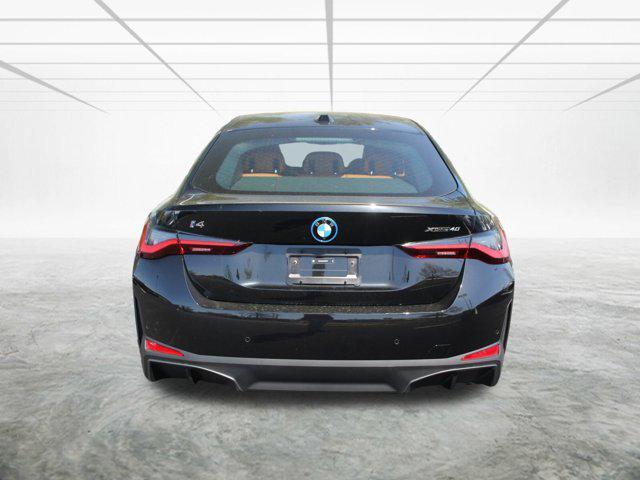 Photo of 2025 Black Sapphire Metallic BMW i4 Gran Coupe