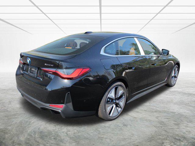Photo of 2025 Black Sapphire Metallic BMW i4 Gran Coupe