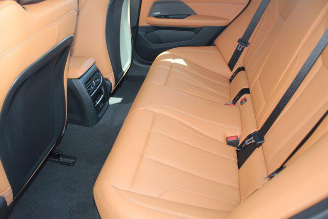 Photo of 2025 Black Sapphire Metallic BMW i4 Gran Coupe