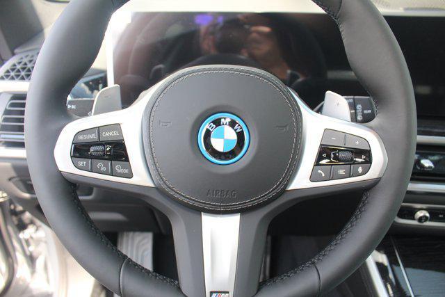 Photo of 2026 Skyscraper Grey Metallic BMW X5 PHEV
