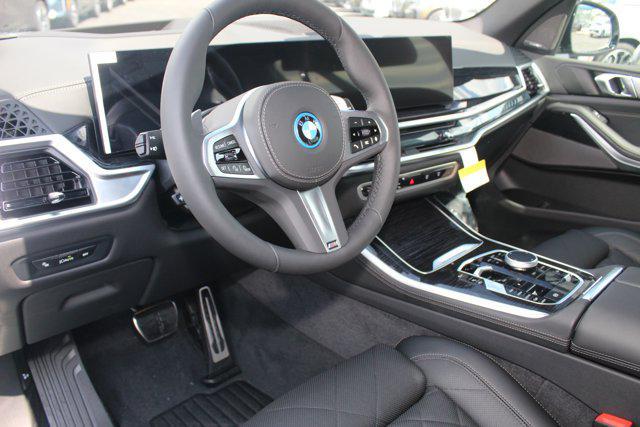 Photo of 2026 Skyscraper Grey Metallic BMW X5 PHEV