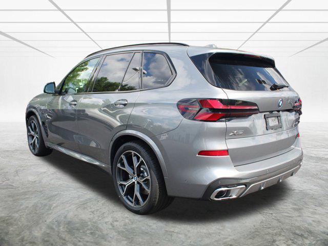 Photo of 2026 Skyscraper Grey Metallic BMW X5 PHEV