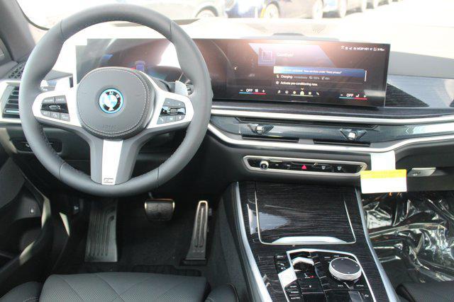 Photo of 2026 Skyscraper Grey Metallic BMW X5 PHEV