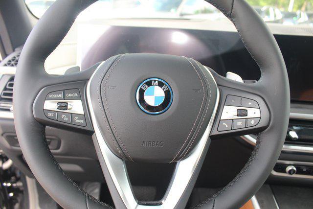 Photo of 2026 Black Sapphire Metallic BMW X5 PHEV