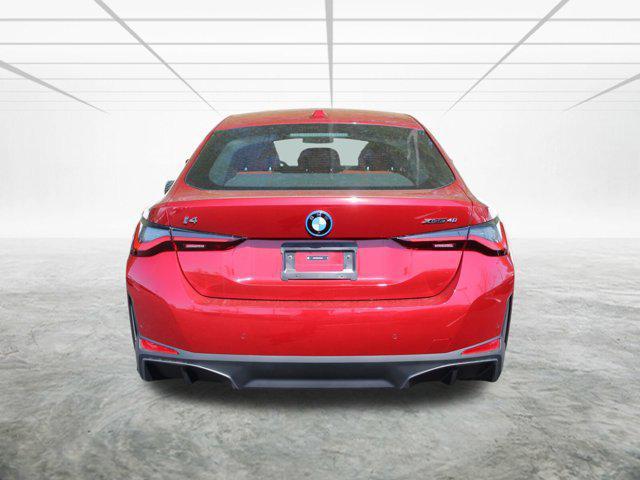 Photo of 2025 Vegas Red Metallic BMW i4 Gran Coupe