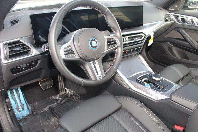 Photo of 2024 Black Sapphire Metallic BMW i4 Gran Coupe