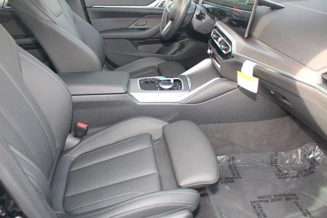 Photo of 2024 Black Sapphire Metallic BMW i4 Gran Coupe