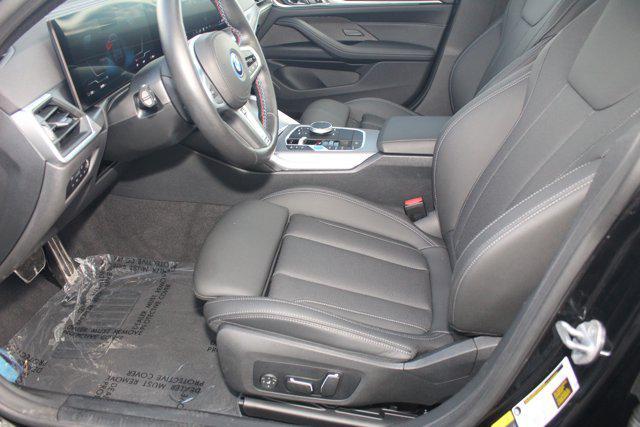 Photo of 2024 Black Sapphire Metallic BMW i4 Gran Coupe