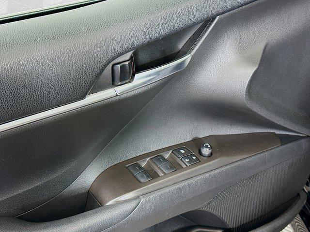 Photo of 2023 Midnight Black Metallic Toyota Camry
