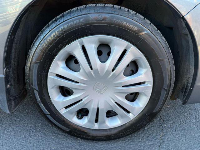 Photo of 2010 Polished Metal Metallic Honda Insight