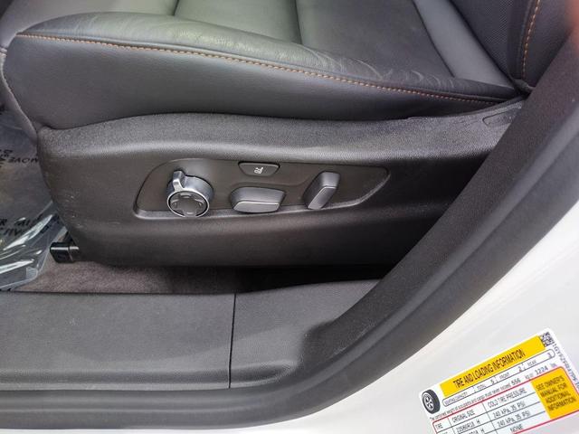Photo of 2023 Crystal White Tricoat Cadillac XT4