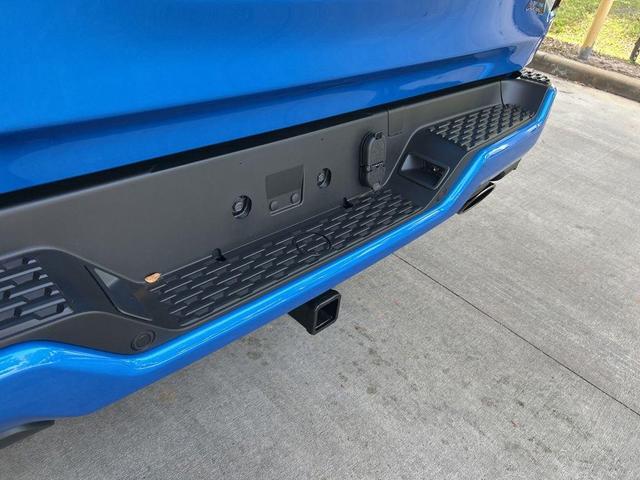Photo of 2025 Hydro Blue Pearlcoat RAM 1500