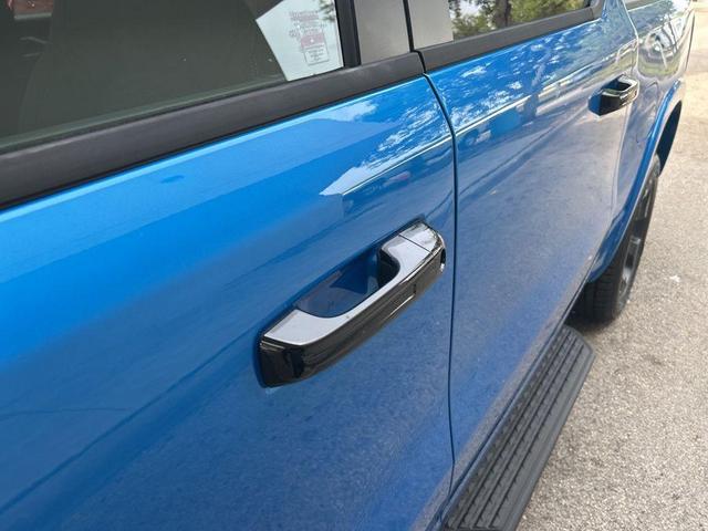 Photo of 2025 Hydro Blue Pearlcoat RAM 1500