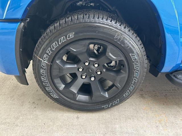 Photo of 2025 Hydro Blue Pearlcoat RAM 1500