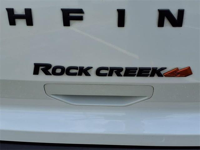 Photo of 2024 Pearl White Tricoat/Super Black Nissan Pathfinder