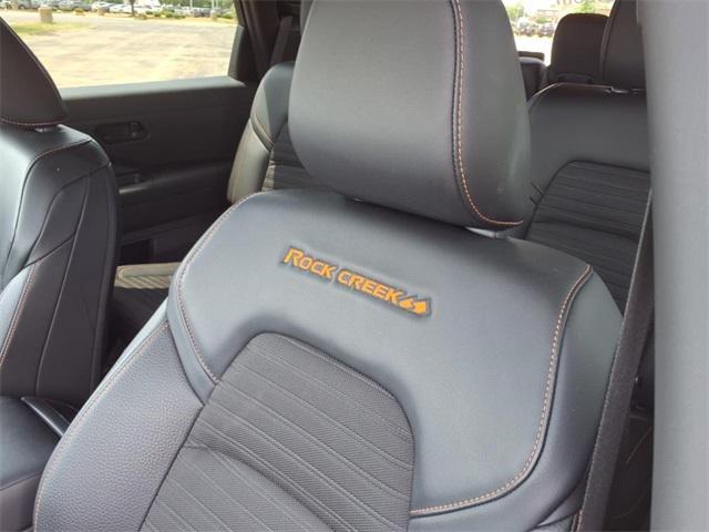 Photo of 2024 Pearl White Tricoat/Super Black Nissan Pathfinder