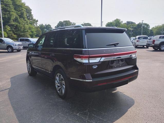 Photo of 2024 Diamond Red Metallic Tinted Clearcoat Lincoln Navigator