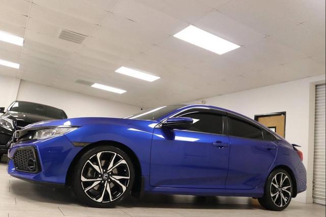 Photo of 2018 Aegean Blue Metallic Honda Civic