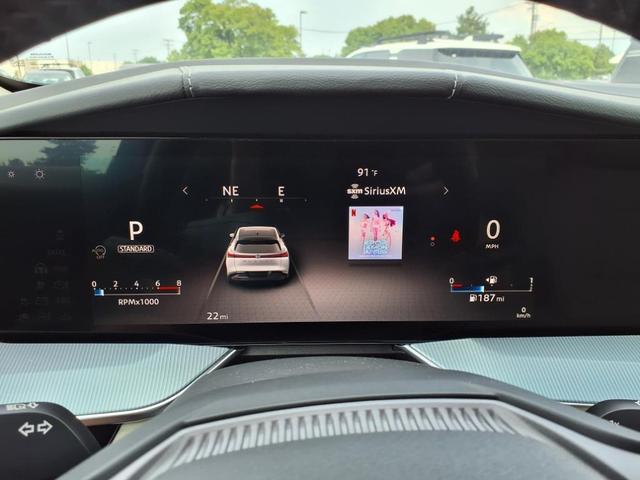 Photo of 2025 Aurora Blue Pearl Metallic/Super Black Nissan Murano