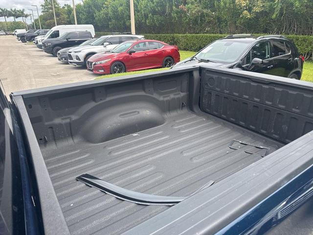 Photo of 2024 Patriot Blue Pearlcoat RAM 1500