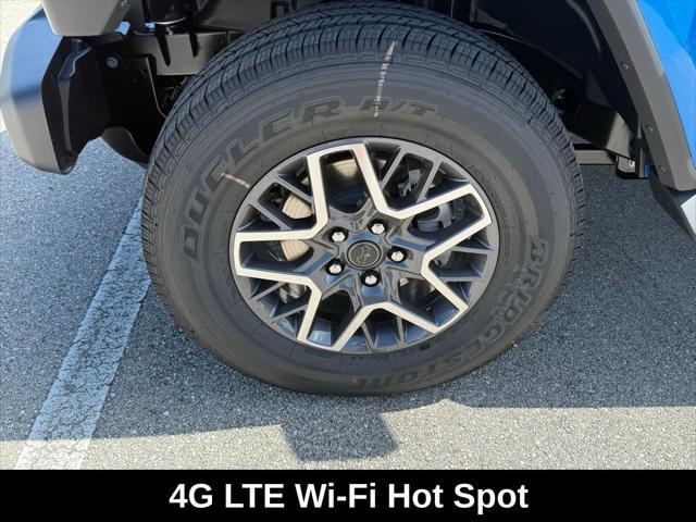 Photo of 2025 Hydro Blue Pearlcoat Jeep Wrangler