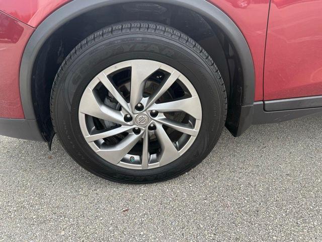 Photo of 2015 Cayenne Red Nissan Rogue